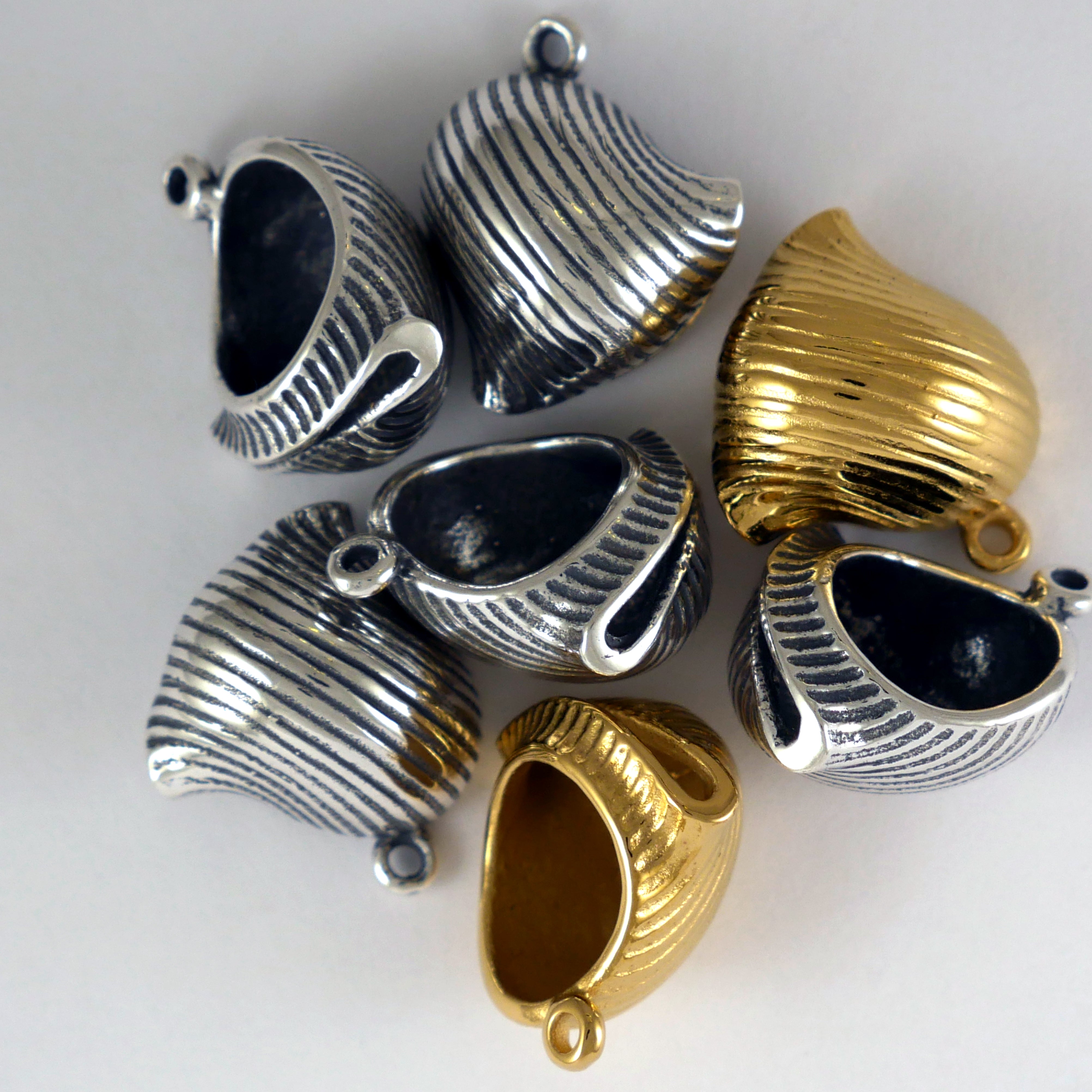 silver and gold lumache pasta shell charms