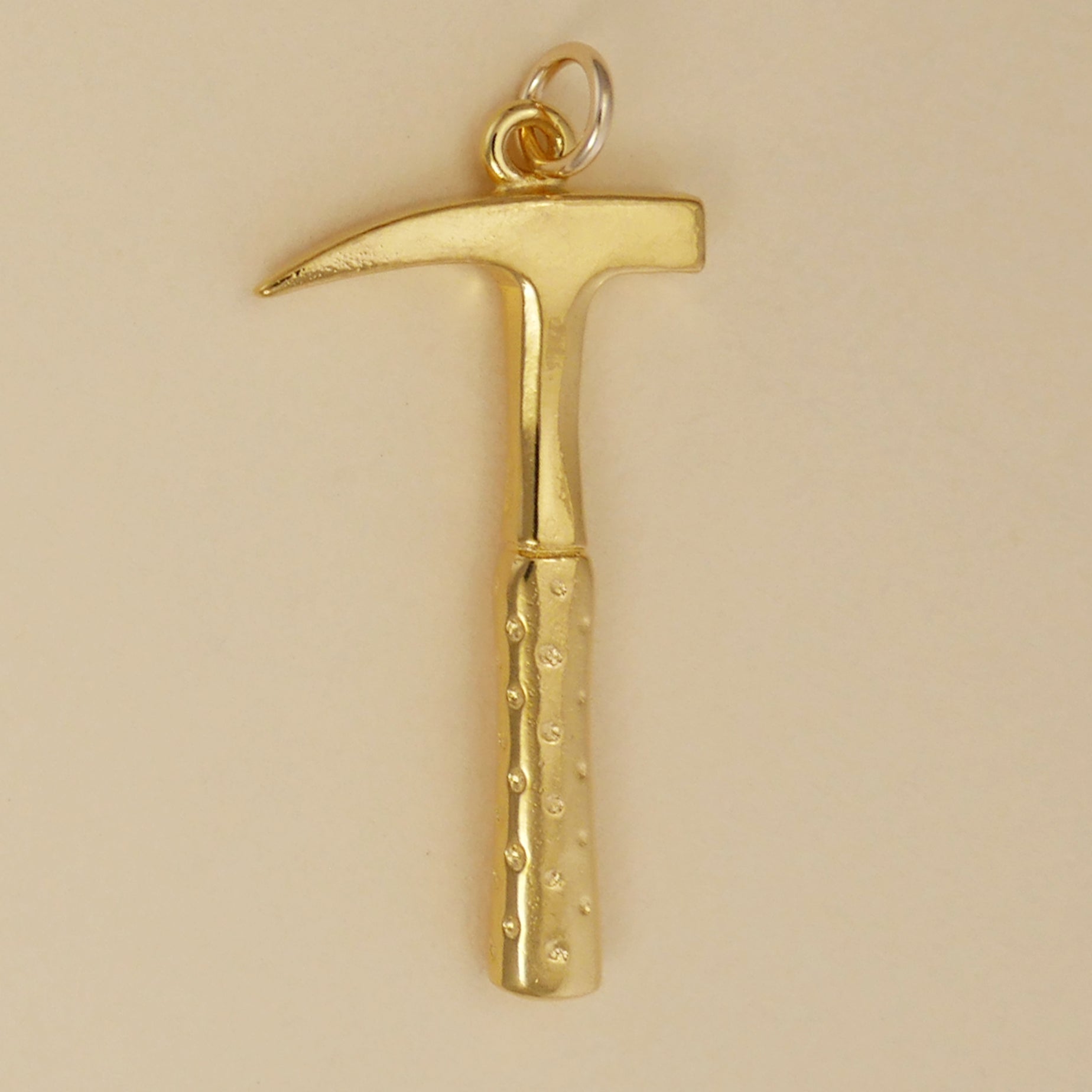 Gold hammer pendant online